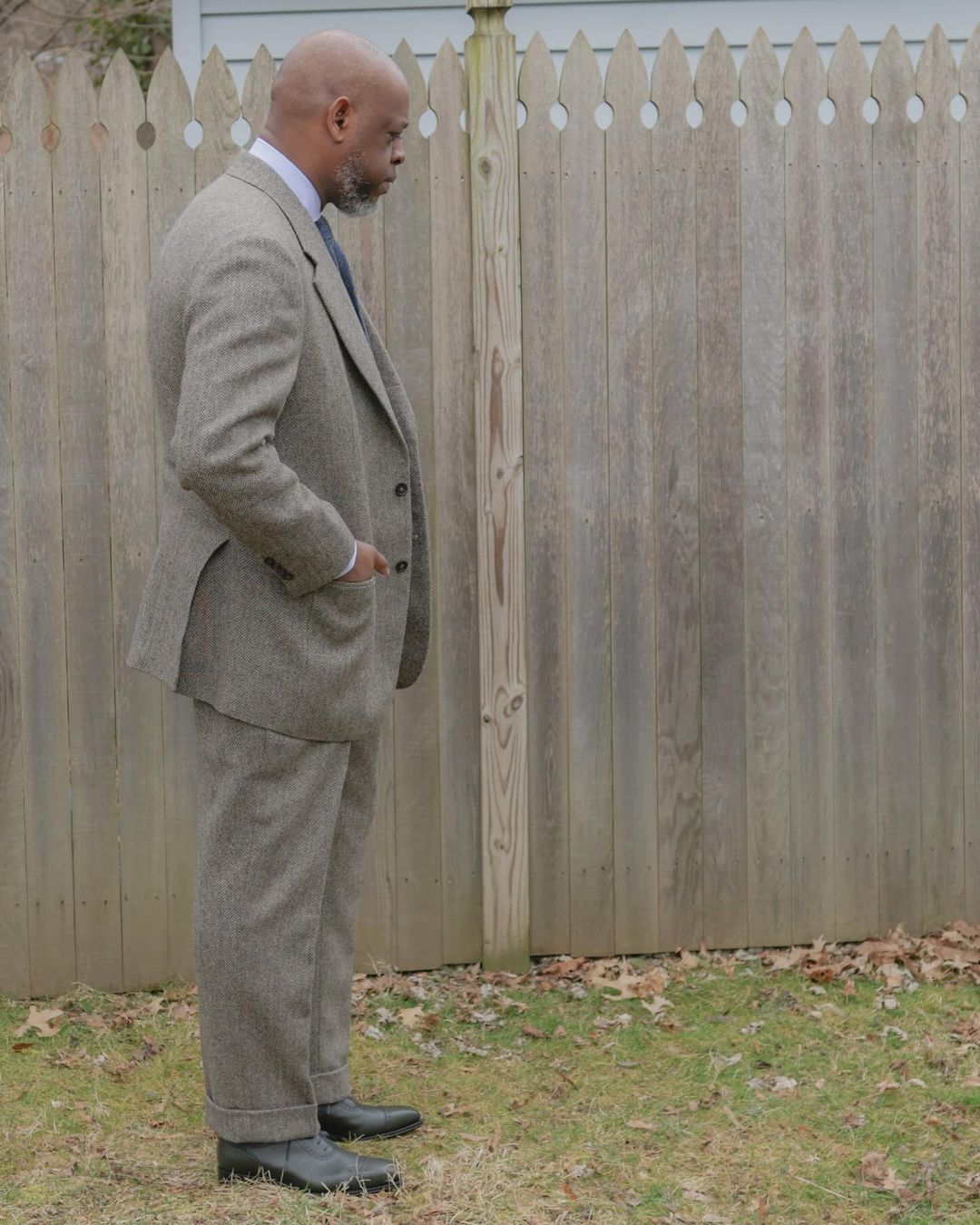 Vladimir Riché in a grey glen check suit